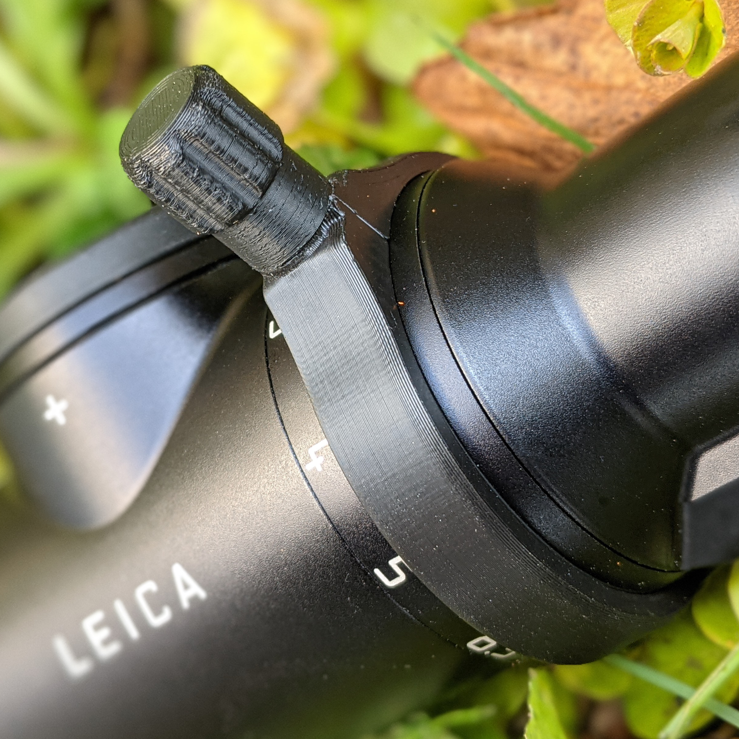 Zubehör für Zielfernrohre: Schnellverstellhebel für den Zoom der Leica Magnus Zielfernrohrserie. Inline Ausführung in Nachtschwarz.